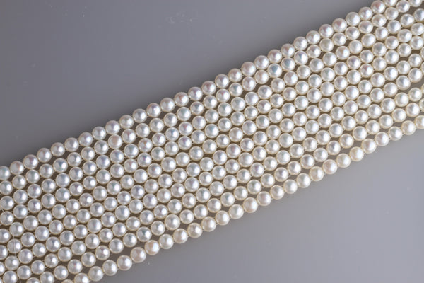 Two Hold Button Freshwater Pearl Strand 8-8.5mm